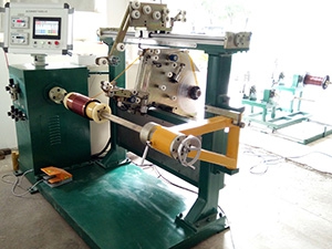Máquina automática para enrolar bobina (com aplicação automática de isolante)